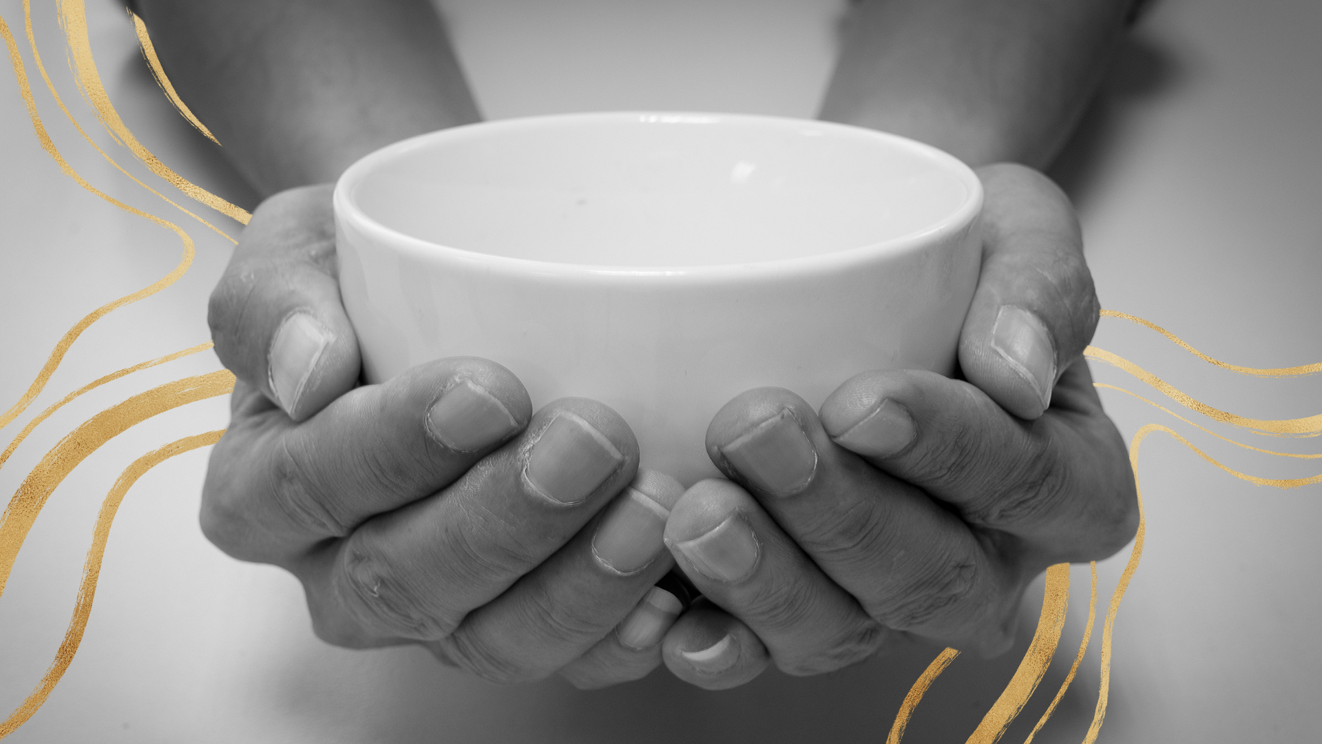 Hands holding an empty bowl